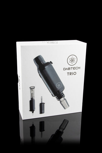 Product shot of a DabTech Trio e-nail with its components displayed on its packaging and reflected on a glossy surface.