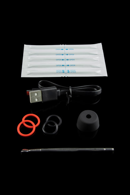 Cannabis vape pen kit including device, USB charger, cartridges, and mouthpiece covers on a black background.