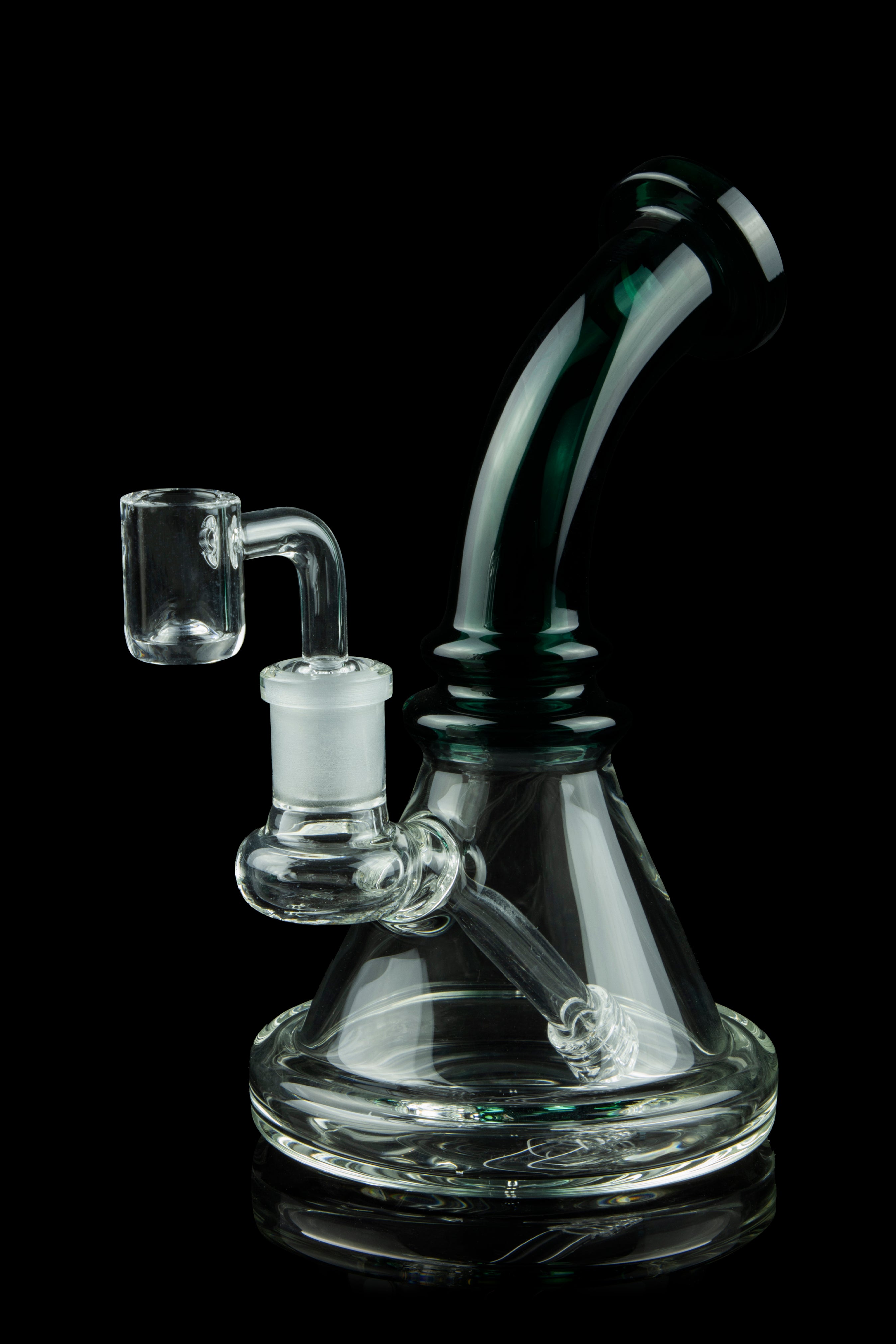 Clear glass water pipe (rig) with a quartz banger, isolated on black.