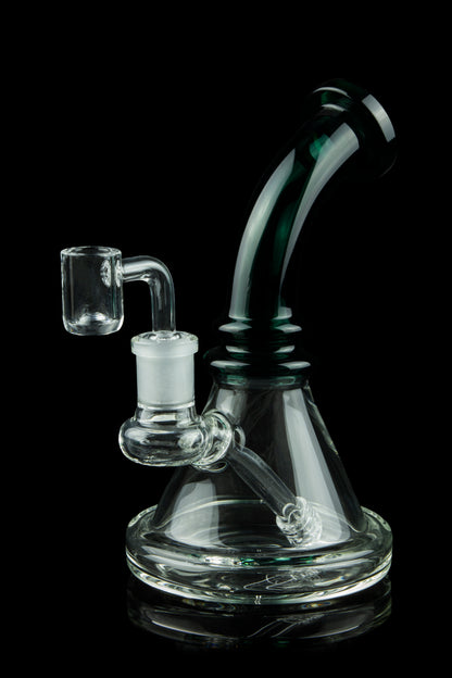 Clear glass water pipe (rig) with a quartz banger, isolated on black.