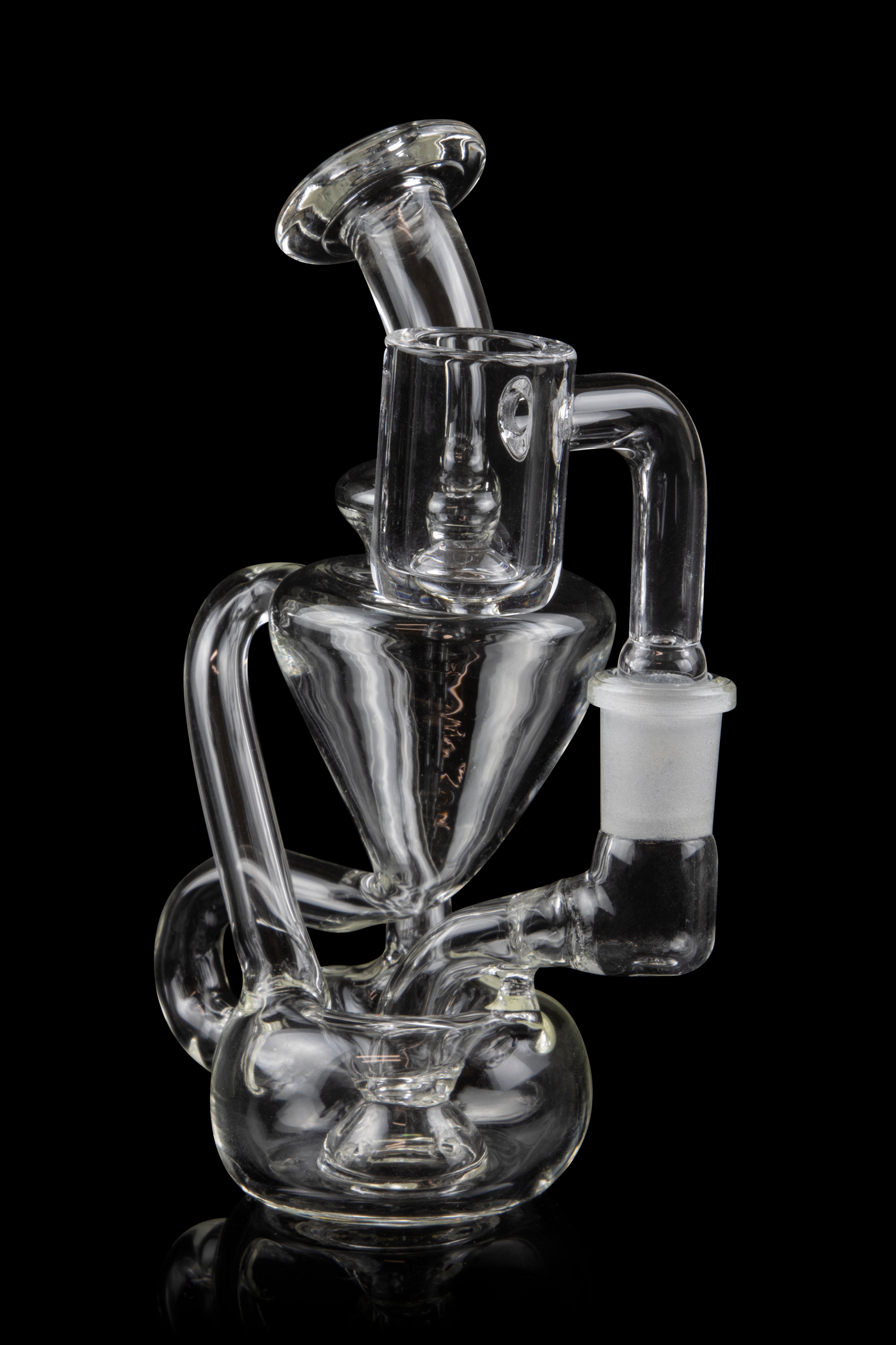 Clear glass water pipe (rig) with intricate looping design, isolated on black.