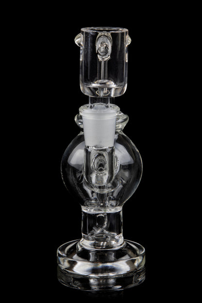 Clear glass bubbler with spherical chamber and intricate design.