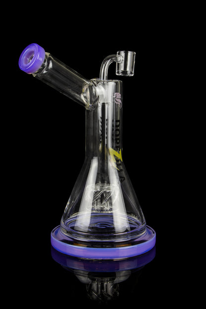Clear glass water pipe (bong) with purple accents and intricate percolator filtration system, isolated on a black background.
