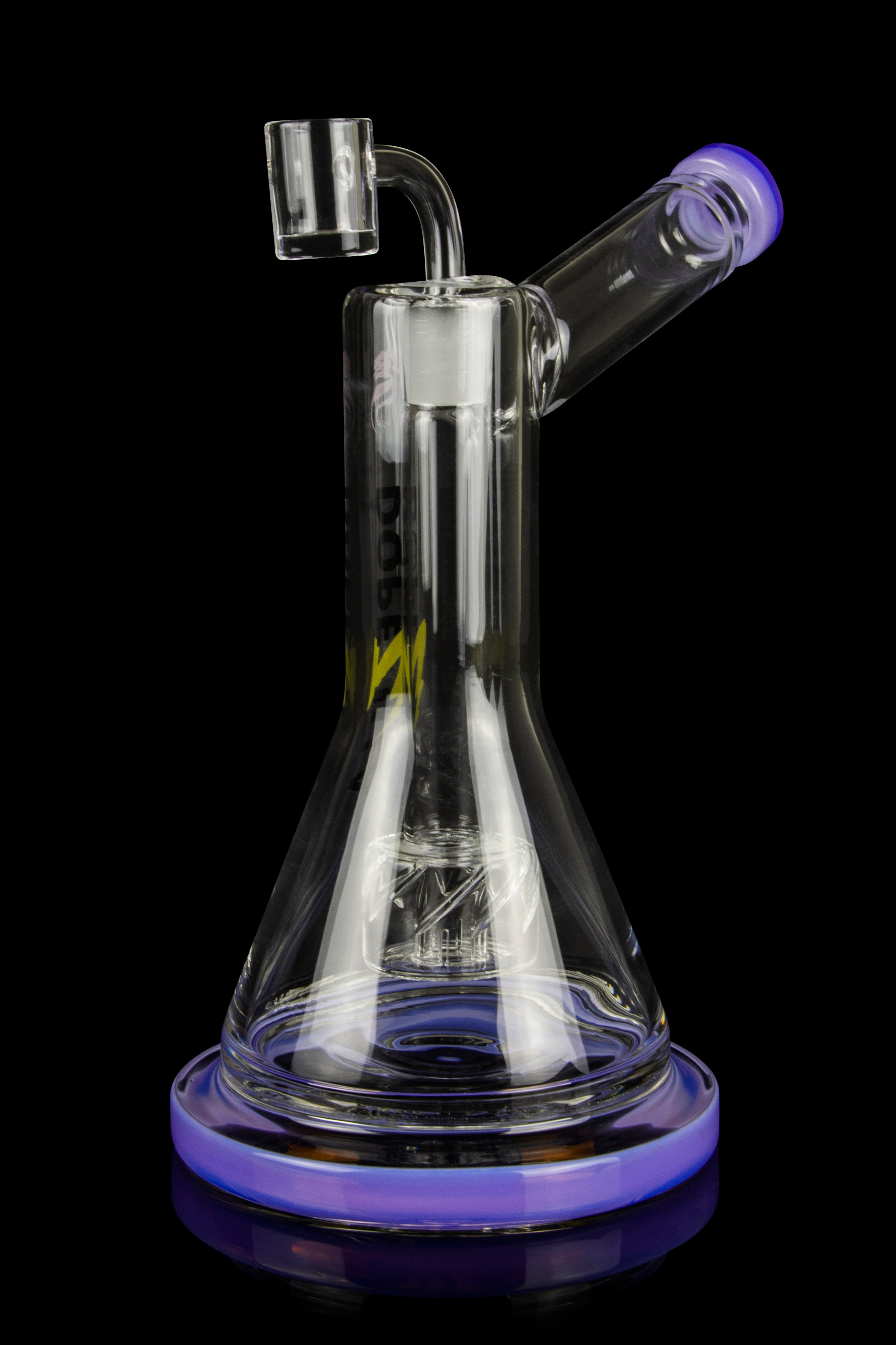 Purple and clear glass dab rig with intricate internal diffusion and a quartz banger.