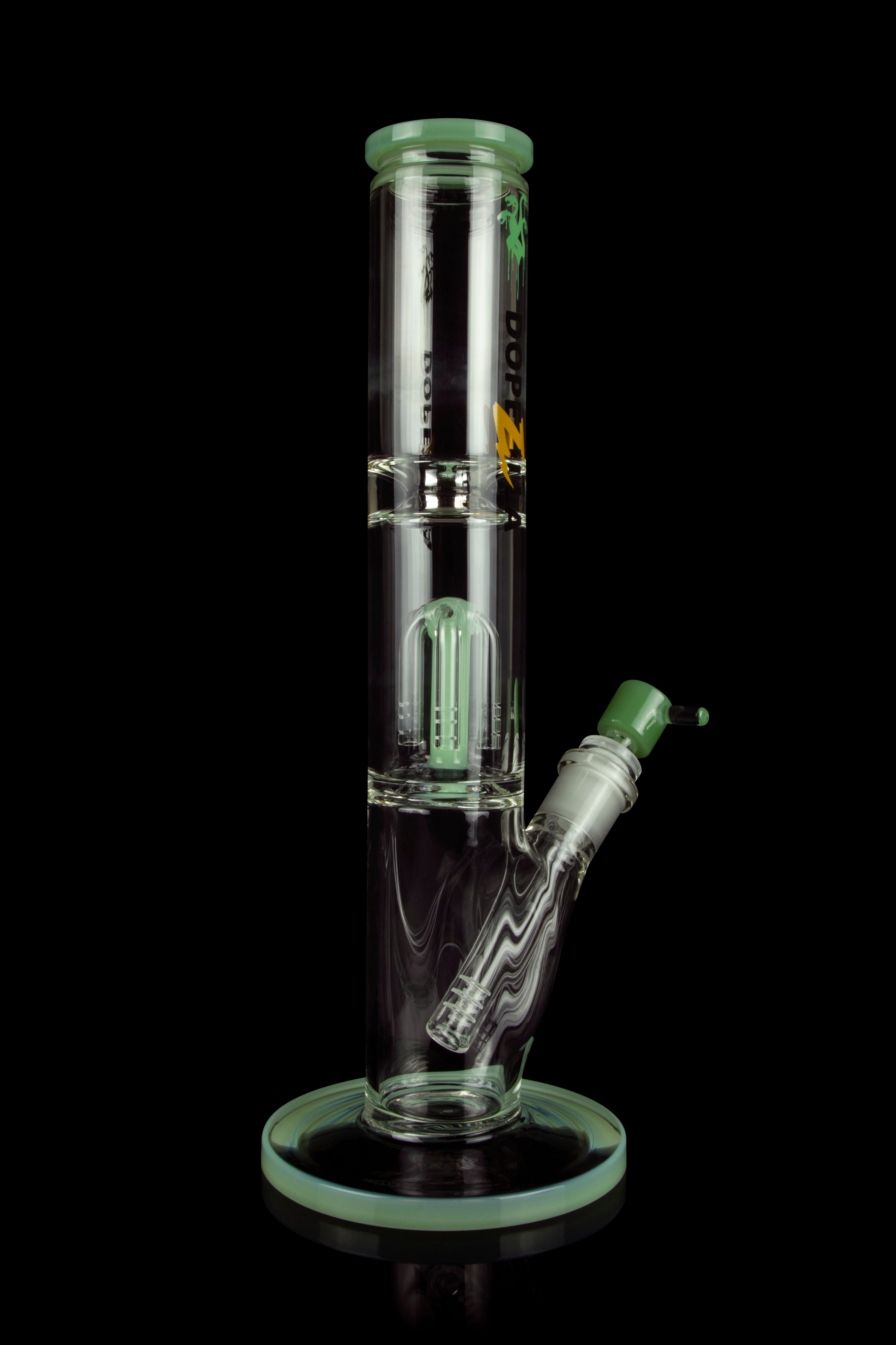 Green glass water pipe with multiple diffusion tubes, isolated on a black background.