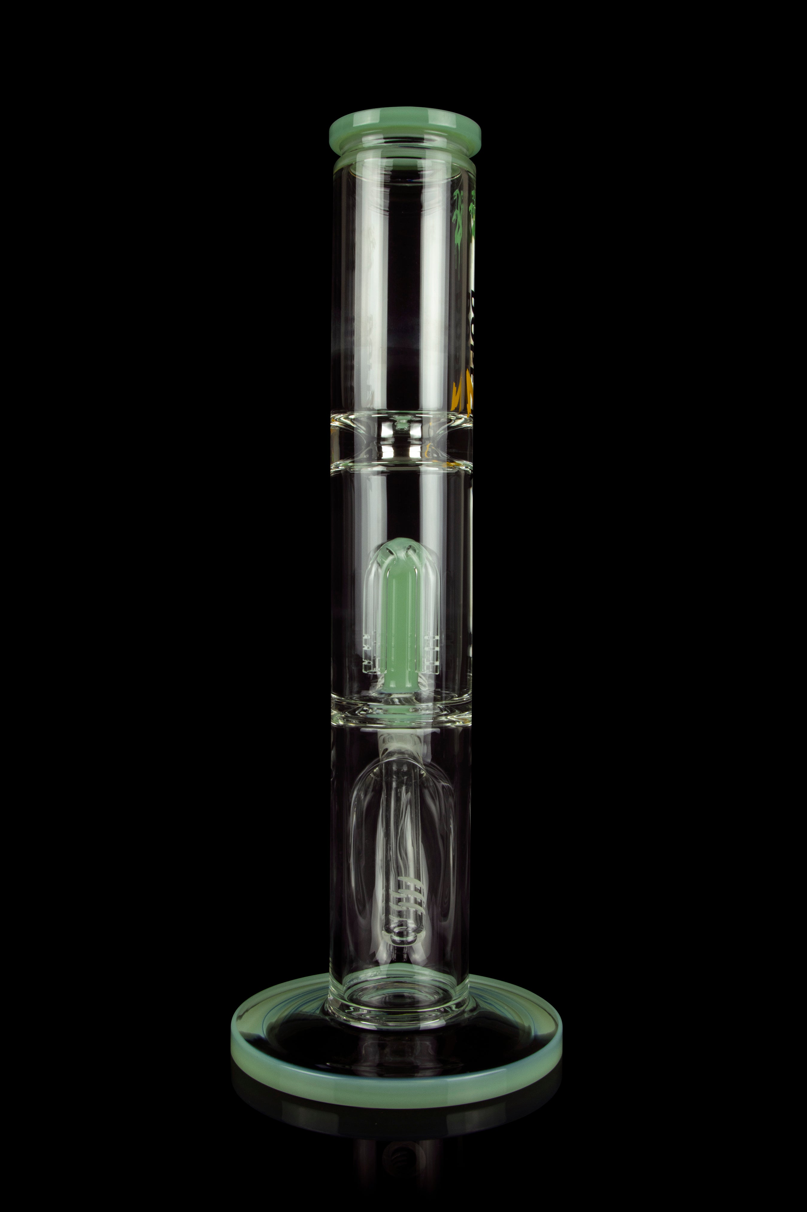 Green glass water pipe (bong) with percolators, isolated on a black background.