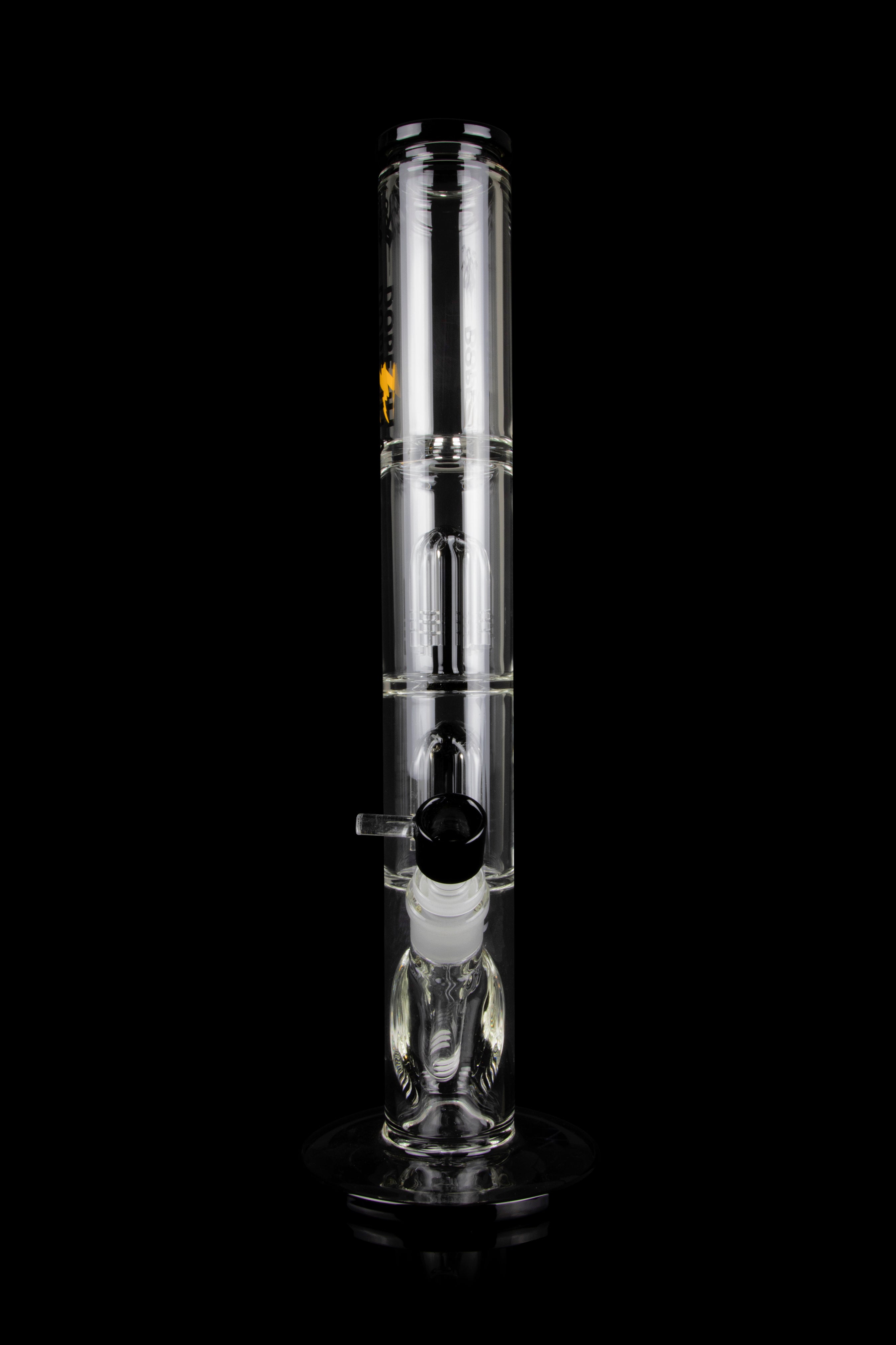 Clear glass bubbler water pipe with ice pinches and a removable diffuser downstem, isolated on a black background.
