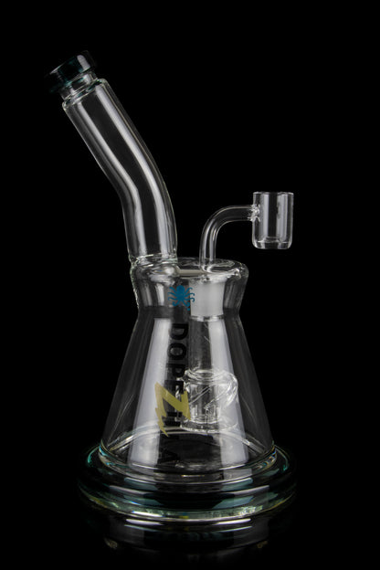 Clear glass water pipe (bong) with intricate percolator and accompanying glass bowl, isolated on a black background.