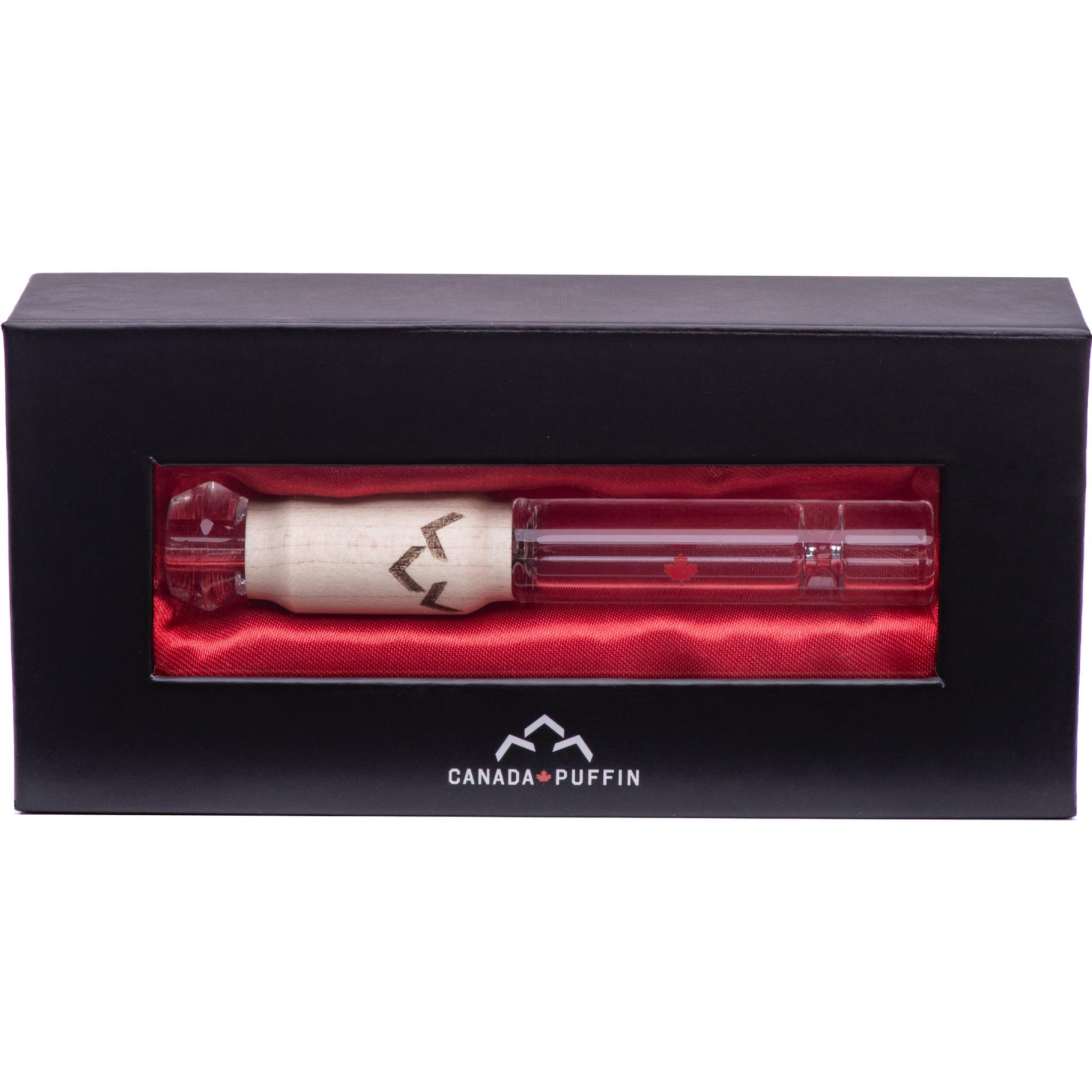 Front view of the Canada Puffin Northern Lights Taster Pipe presented on a red cushioned surface.