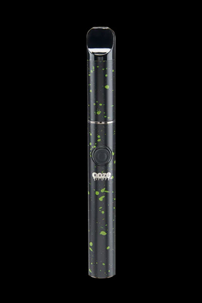 Black cannabis vape pen with green splatter pattern.