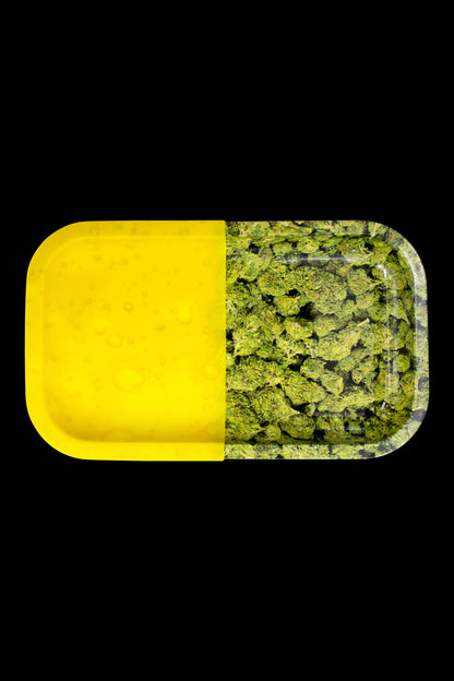 Yellow and green cannabis rolling tray filled with dried flower.