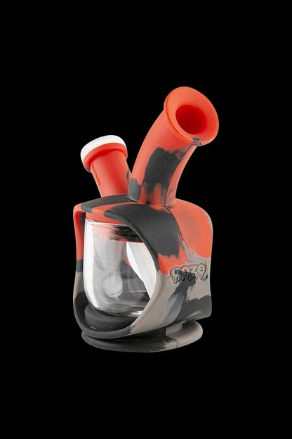 A front view of the Ooze Kettle Silicone Water Pipe, showcasing its rounded shape and textured, dark-colored silicone material.
