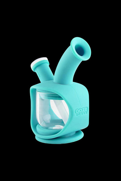 A three-quarter view of the Ooze Kettle Silicone Water Pipe, showcasing its smooth, kettle-like shape and translucent material.