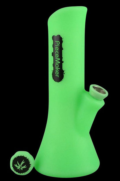 Front view of the PieceMaker Water Pipe - Kali, a clear glass pipe presented against a black background.