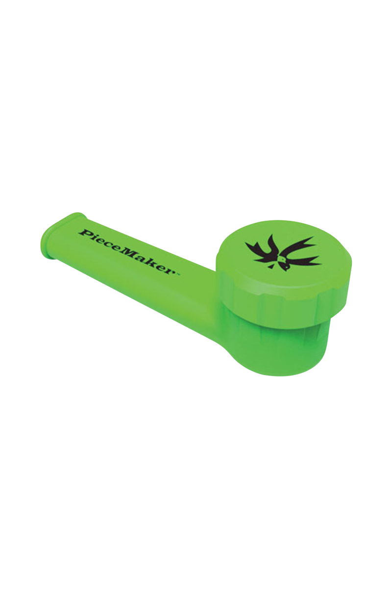 A vibrant, angled close-up of the PieceMaker "Karma" Silicone Pipe, showcasing its curved design and smooth, green texture.