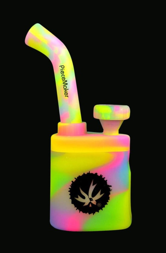 Front view of the Piecemaker "Klutch" Silicone Water Pipe, showcasing its colorful, sculpted design against a black background.
