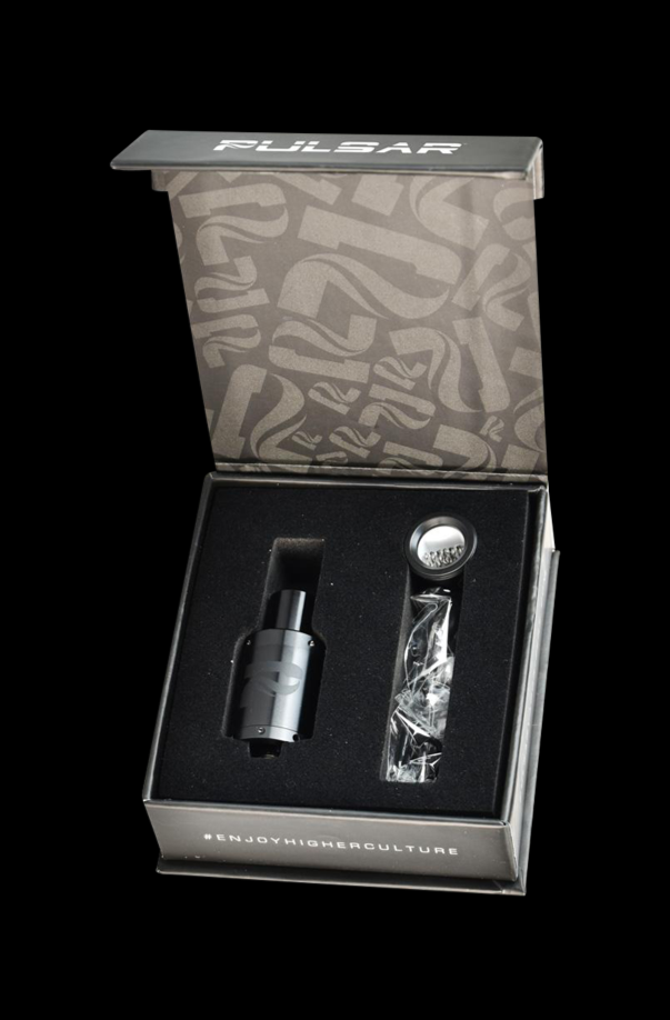 The black, full metal Pulsar APX Wax V3 Atomizer Kit is displayed in its packaging, with a detailed view of the atomizer inside.