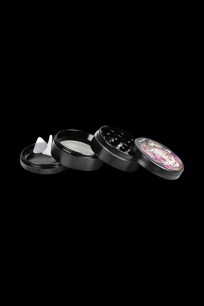 The Pulsar Artist Series 4-Piece Metal Grinder - MrOw is shown open, displaying its four metal pieces in a top-down angled view.