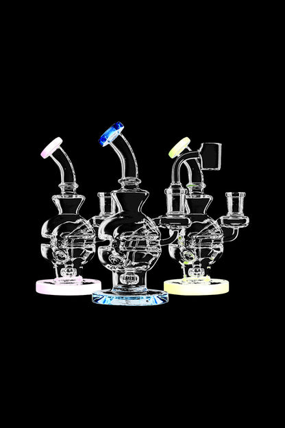 A studio shot displays the Pulsar Mini Egg Dab Rig, showcasing its compact size and clear glass construction from a slightly angled perspective.