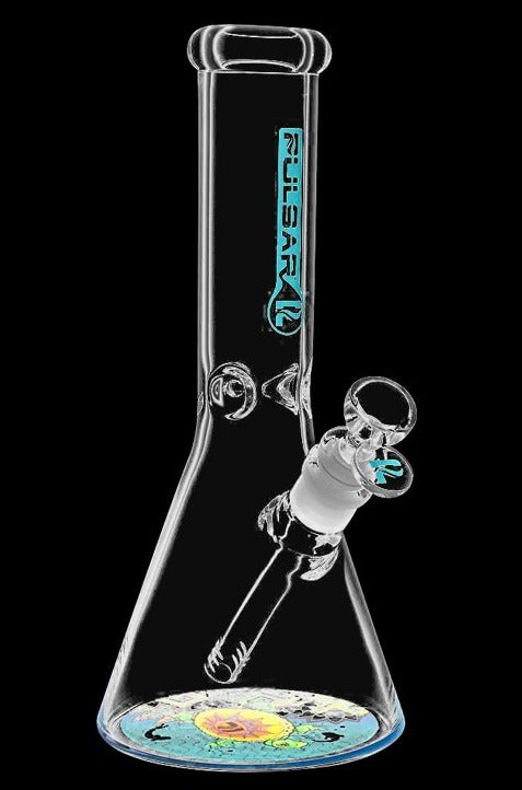 A front view of the Pulsar Psychedelic Turtle Beaker Water Pipe shows a clear glass beaker with a colorful turtle design at the base.