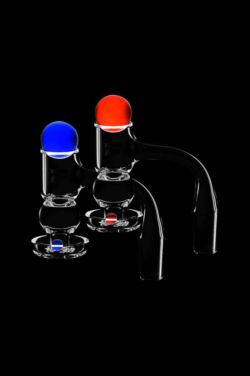 Front view of the Pulsar Quartz Terp Slurper Hybrid Set, displaying the clear quartz banger against a stark black backdrop.