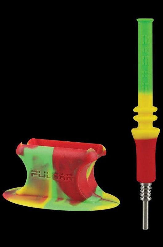 Front view of the Pulsar RIP Vapor Straw with Stand - Rasta, featuring a red, yellow, and green color scheme, resting on a dark surface.