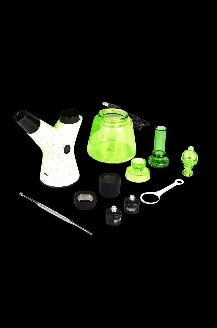 Green glass cannabis smoking accessories including a bubbler, water pipe, dab tools, and various attachments, displayed on a black background.