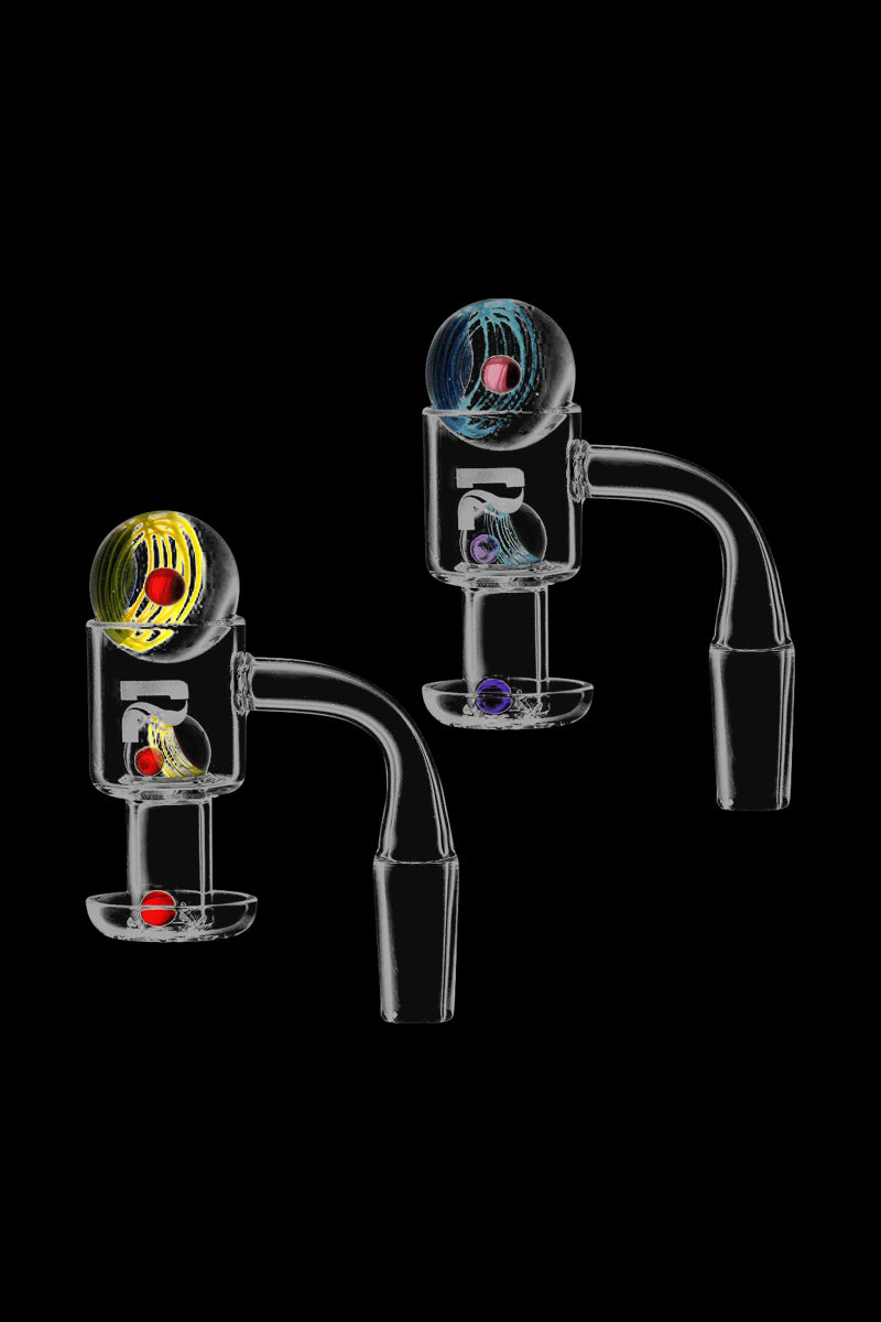 A studio shot of the Pulsar Terp Slurp Cosmos Set with Banger - 4 Pack, showcasing the clear glass set at a slight angle on a dark background.