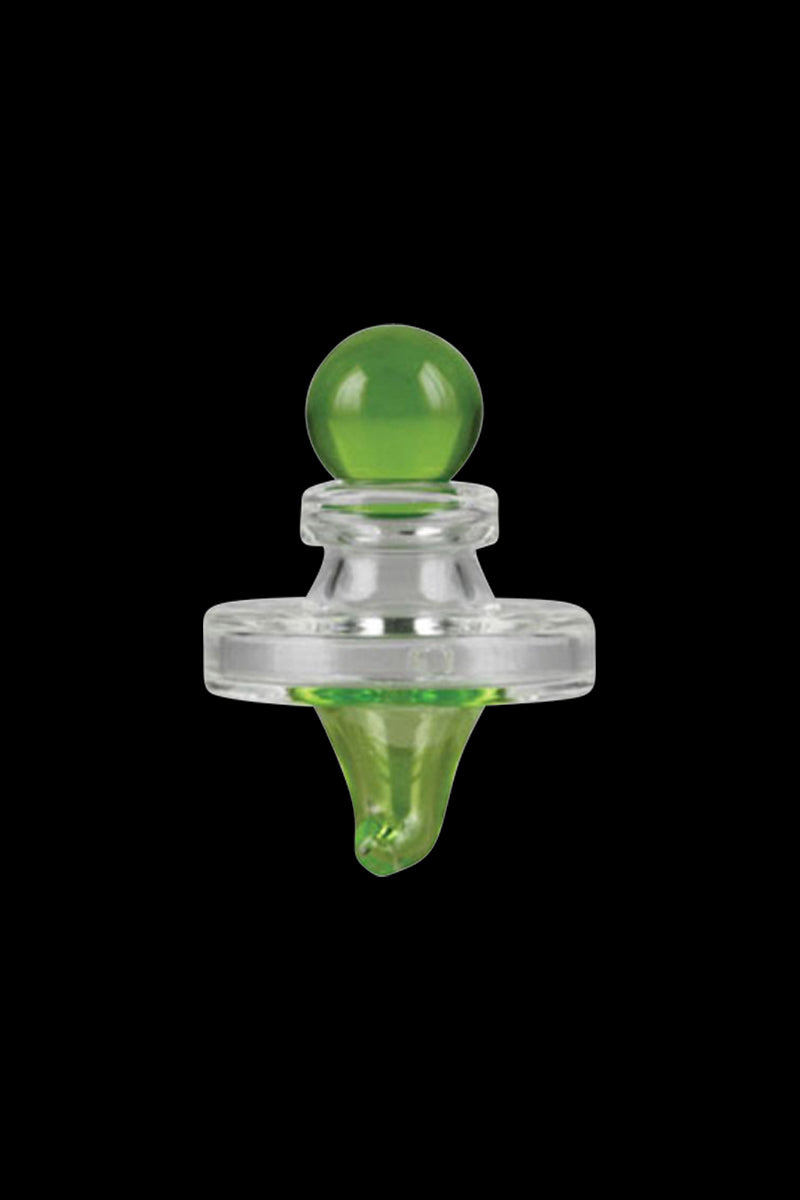 A close-up shot of the Pulsar UFO Directional Carb Cap, displaying its rounded, translucent green form against a dark backdrop.