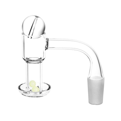 Angled side view of the Quartz Banger with Ball Carb Cap & Glow Terp Beads Set showing the clear quartz banger, a spherical carb cap perched on top, and two pale glowing terp beads in the banger dish against a white background