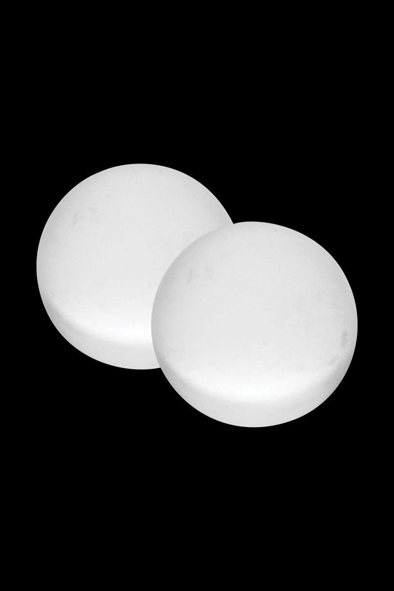 Two white spherical Pulsar Quartz Terp Beads - 2 Piece Set 5.00% Off Auto renew shown close-up on a black background, slightly overlapping and lit from above.