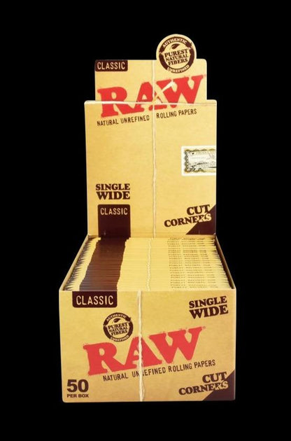 Front view of a box of RAW "Cut Corners" Single Wide Rolling Papers, displaying the branded packaging and product name on a plain background.