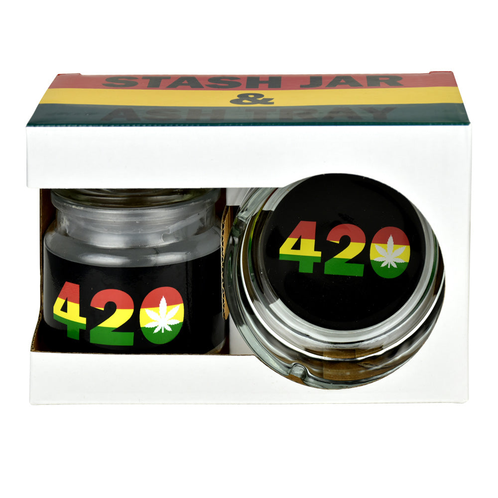 Close-up of the Rasta Ashtray and Stash Jar Set, showing a black jar with a colorful, patterned label.
