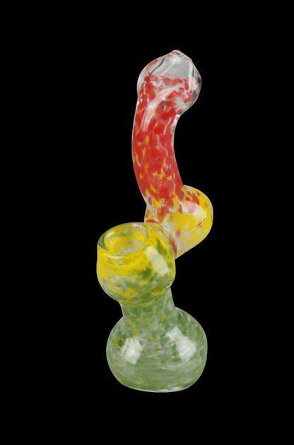 Front view of the Rasta Bubbler Hand Pipe, a colorful glass bubbler with a curved design against a dark background.