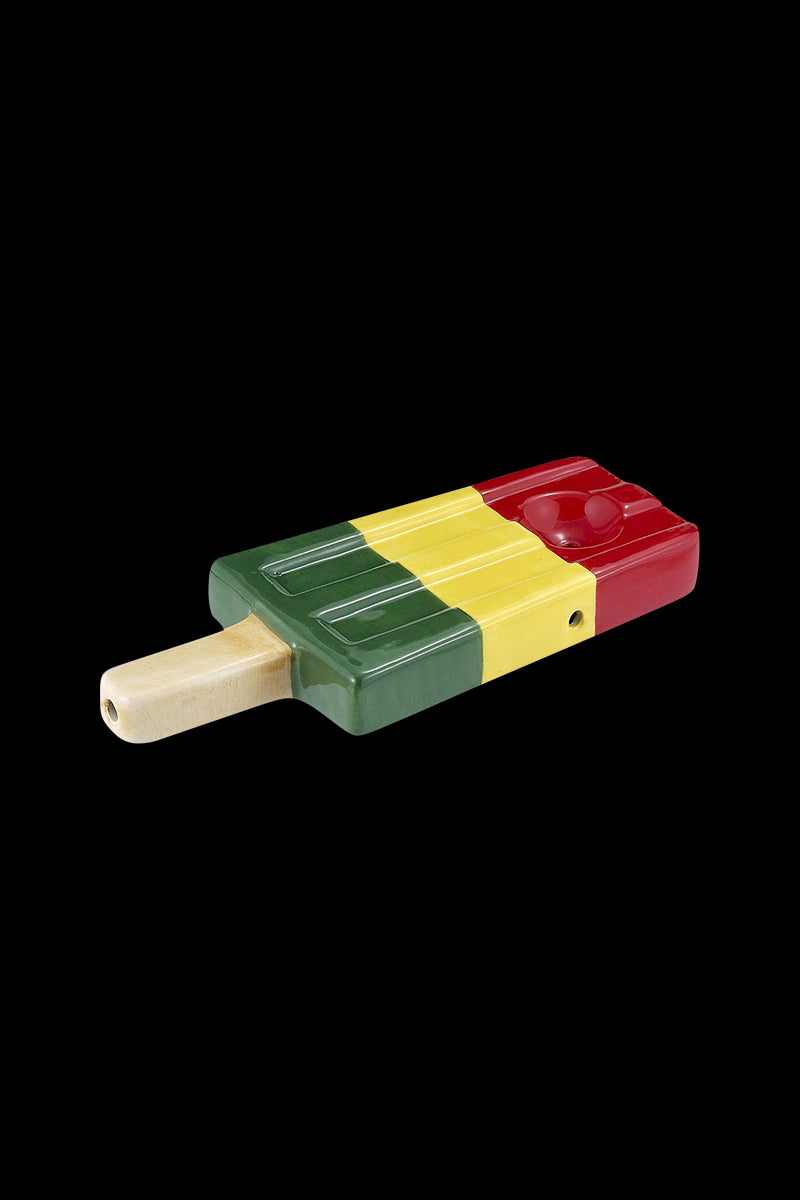 Front view of the Roast & Toast Rasta Ice Pop Ceramic Pipe, showcasing its colorful, playful design.