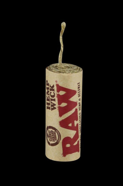 A close-up, angled view of the RAW Natural Hemp Wick Rolls, showcasing the tightly wound, natural-colored hemp fiber on the spool.
