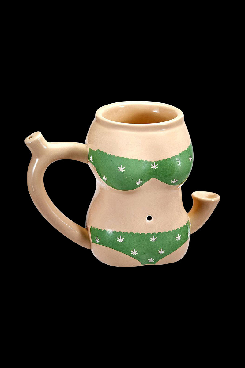 A slightly angled studio shot of the Roast & Toast Ceramic Pipe Mug - Bikini Body, resembling a white ceramic bust with a pipe mouthpiece.