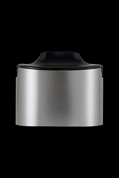 Silver cannabis oil concentrate container with black lid.