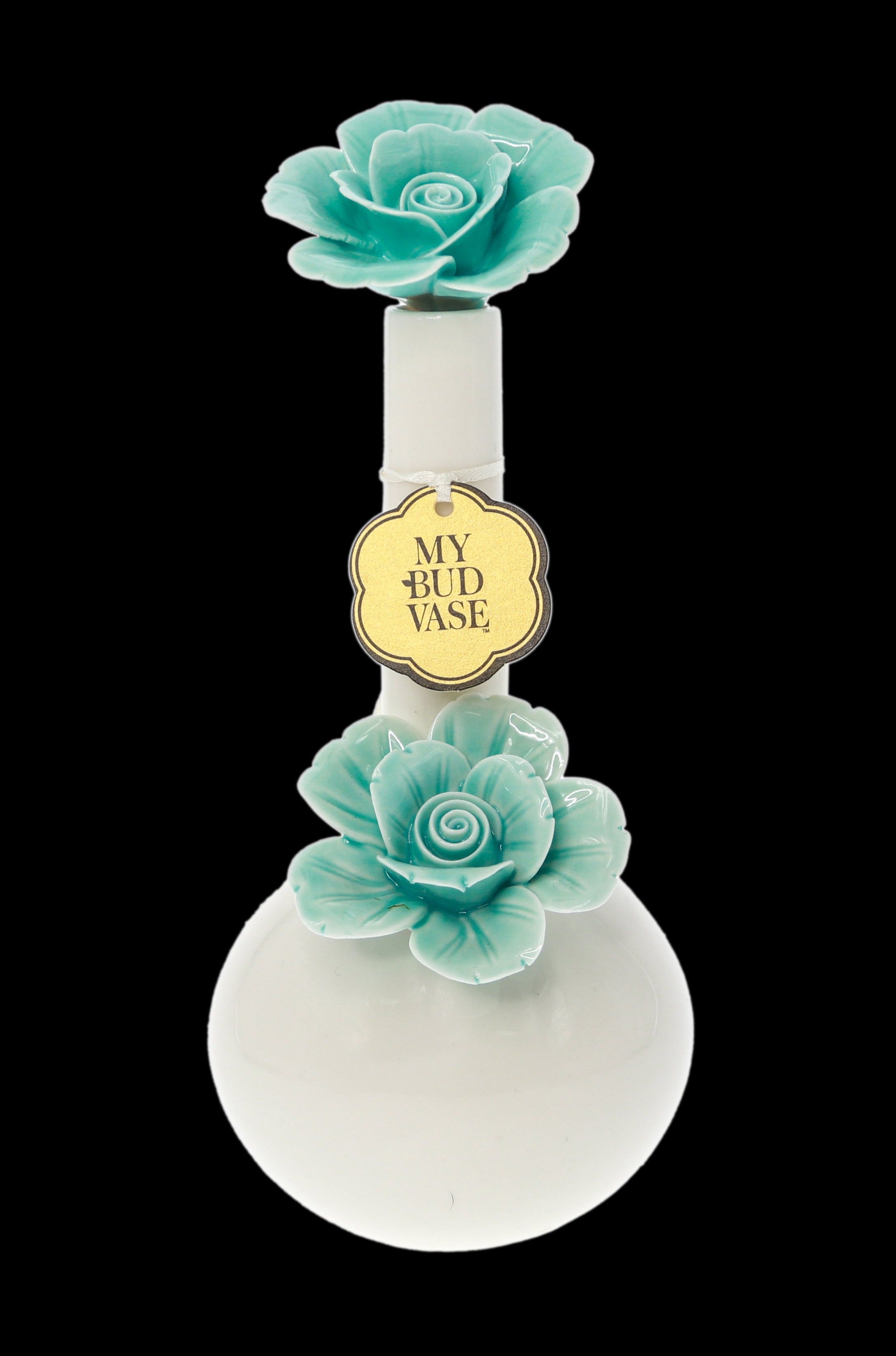 A white glass water pipe (“bud vase”) decorated with sculpted teal cabbage roses.