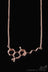 Close-up of Rose Gold - Smoke Cartel THC Molecule Necklace