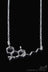 Close-up of Silver Pendant - Smoke Cartel THC Molecule Necklace