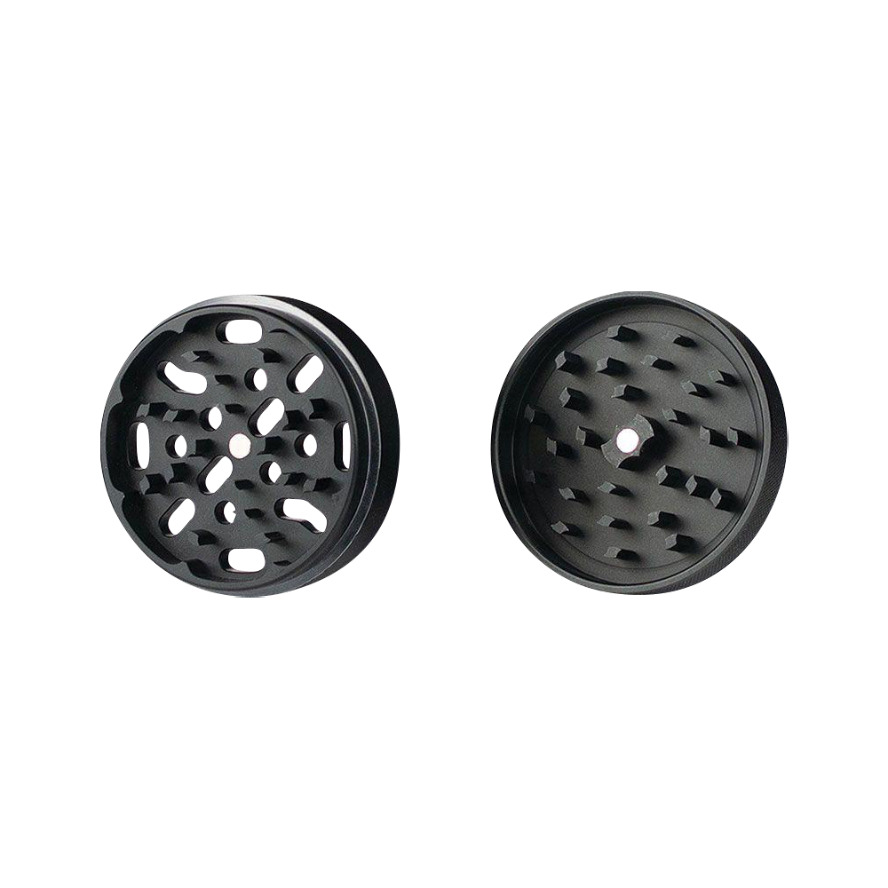 A top-down view of the solid body Kannastor 4-Piece Grinder, showcasing its circular shape and multi-part design.