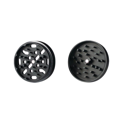 A top-down view of the solid body Kannastor 4-Piece Grinder, showcasing its circular shape and multi-part design.