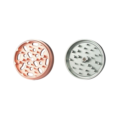 A top-down view of the Kannastor 4-Piece Solid Body Grinder, showcasing its multi-tiered, metallic finish design.