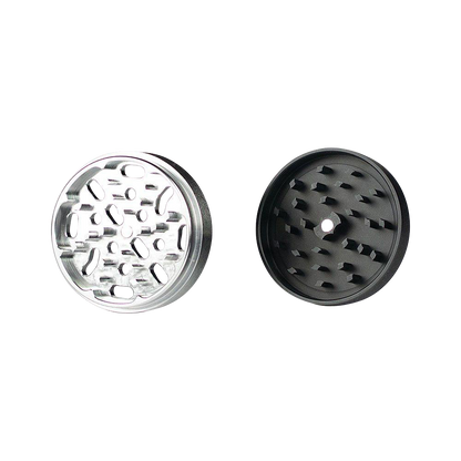 Close-up of the Kannastor 4-Piece Solid Body Grinder, showcasing its four-part metallic construction in a circular arrangement.