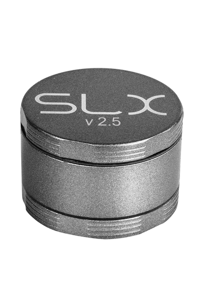 Front view of the SLX Ceramic Coated 2.5" Medium Grinder, showing its cylindrical, metallic form and layered design.