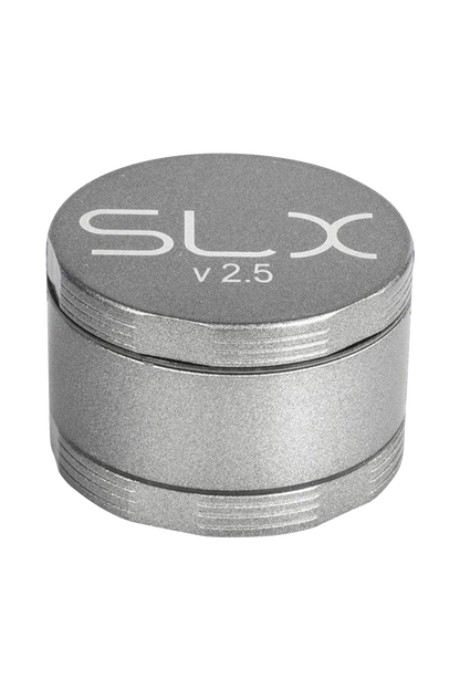 A close-up, top-down view of the SLX Ceramic Coated 2.5" Medium Grinder, showcasing its cylindrical metal design.