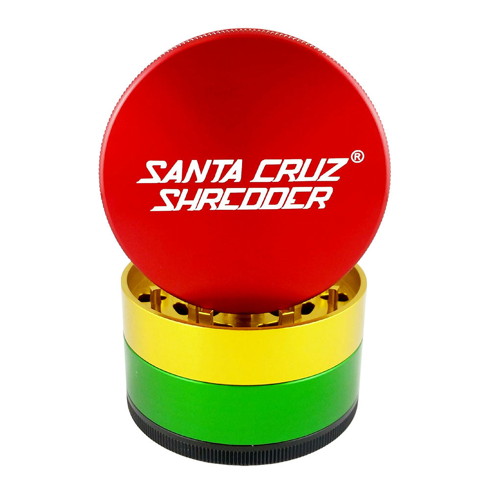 A close-up, angled view of the Santa Cruz Shredder Grinder - Large, showcasing its multi-tiered metallic finish.