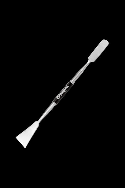 A close-up shot of the Skilletools XL Scraper Dabber Tool, angled against a dark background, showing its polished metal finish.