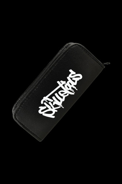 A close-up of the closed Skilletools Travel Kit Dab Handle & Tips, angled slightly on a black background.